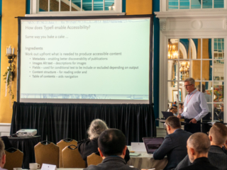 Damian Gibbs presenting at the 2019 Typefi User Conference. The screen shows a slide with the title 'How does Typefi enable Accessibility?' and bullet points on what is needed upfront to produce accessible content, including metadata, alt text for images, fields, content structure, and table of contents.