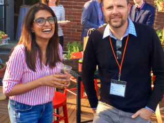Chathini Uduwana and Ben Hauser share a laugh at the rooftop bar.