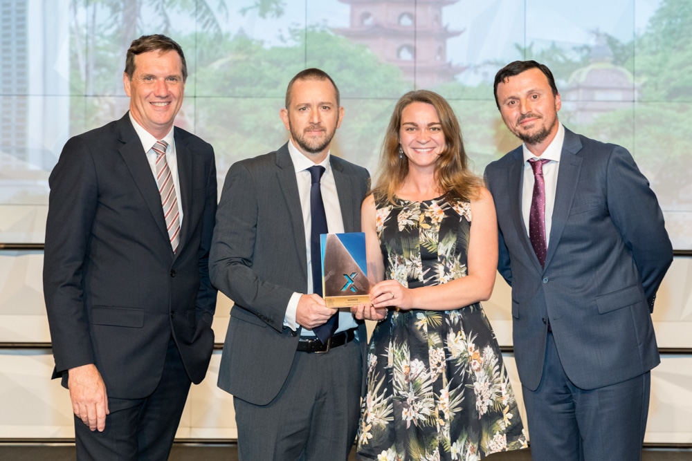 Typefi Financial Controller Michael Cousins and Marketing Associate Shanna Bignell accept the 2016 Premier of Queensland’s Small Business Export Award from State Development Minister Dr Anthony Lynham, and Tom Tsihlis, State Director SME from award sponsor Efic.
