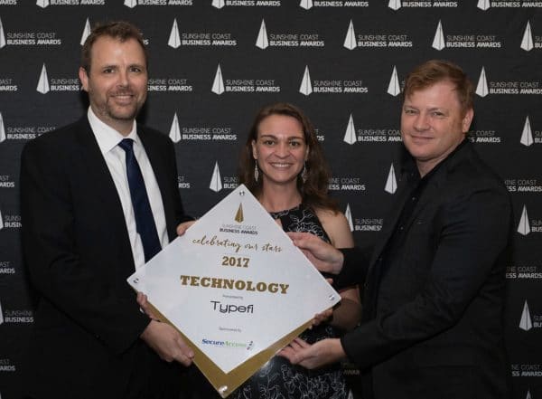 Ben, Shanna and Jason hold up the Technology award.