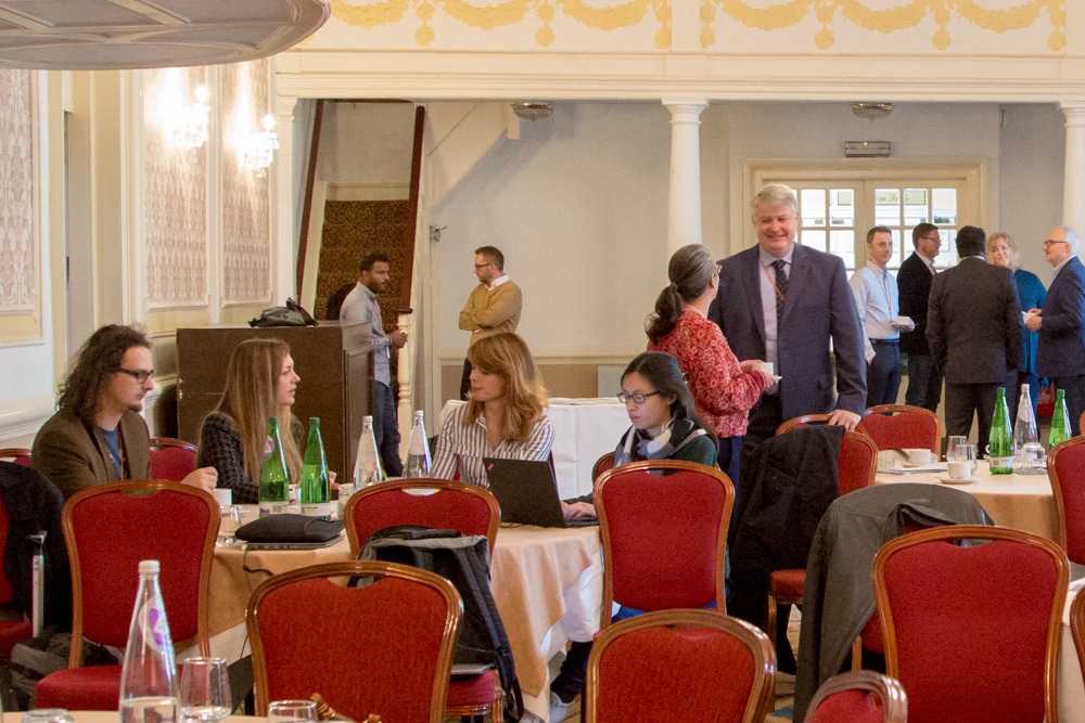 Groups of Conference attendees having a chat over morning tea in the Paganini Ballroom.