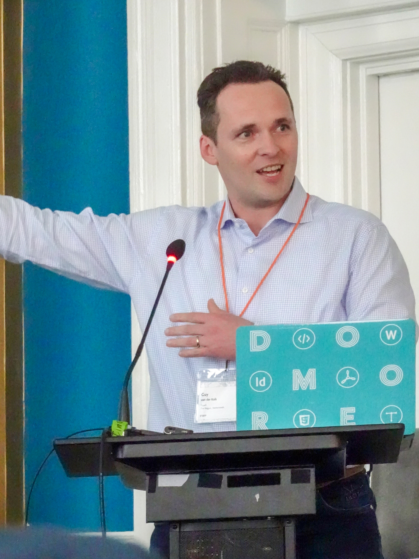 Guy van der Kolk gestures at the screen during his 2019 Typefi User Conference presentation.