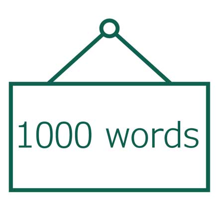 A green picture frame contains the phrase, 1000 words.